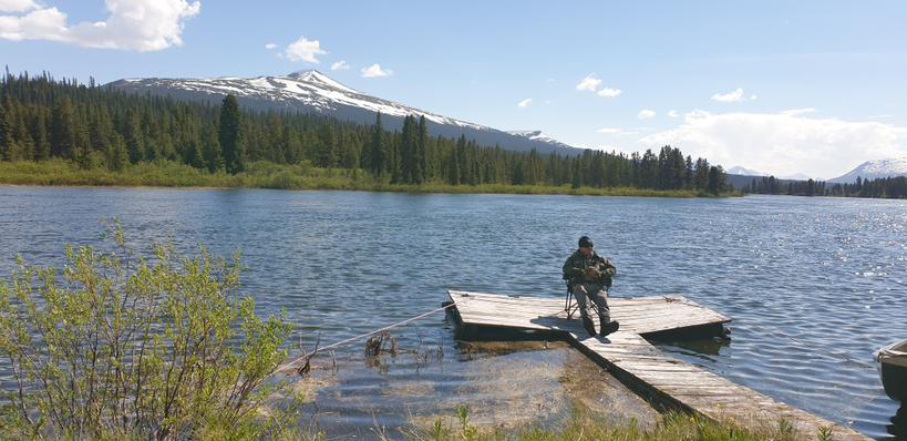 A bloke caught a few rainbows, had a nice lunch. Deserved a break. Nice backdrop.